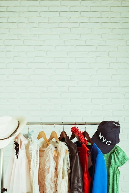 A medium shot of a rack of clothing in a bright, airy boutique with a focus on sustainable materials, such as organic cotton and recycled fabrics. Tags indicating the eco-friendly nature of the garments are visible. The overall impression is one of conscious consumerism and ethical fashion choices.