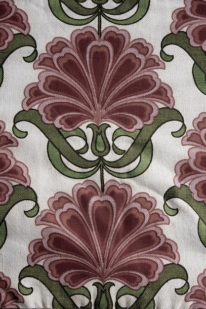 A close-up shot of various retro patterned fabrics, including paisley, floral, and geometric designs. The fabrics are in a range of colors, from muted earth tones to bright and bold hues. The image highlights the textures and details of each print.