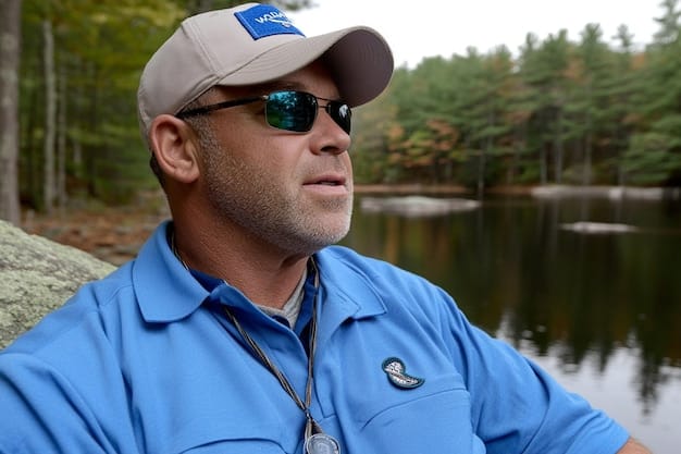 A close-up shot of a person wearing sunglasses with polarized lenses while fishing on a sunny day. The reflection in the lenses shows the water and the person's fishing rod, highlighting the glare reduction capabilities of polarized lenses. The water is sparkling and clear, emphasizing the visual clarity provided by the sunglasses.