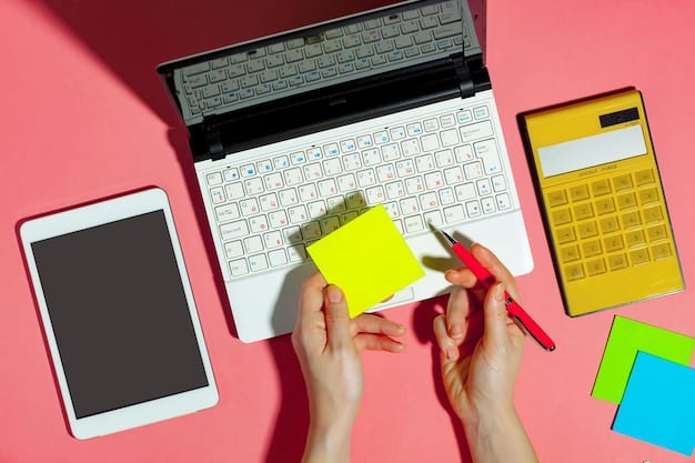 Close-up of hands typing code on a computer, surrounded by sticky notes with digital marketing ideas.