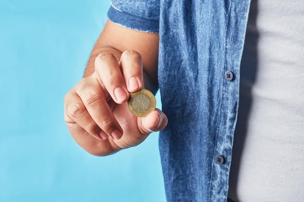 A person's hands holding a set of Spanish Euro coins and banknotes. Focus on the currency. The image conveys financial support, investment and economic benefits.