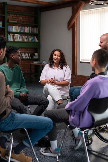 A diverse group of people participating in a therapy session.