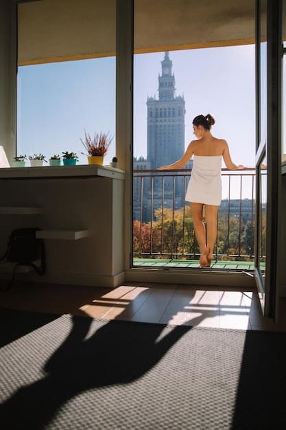 Interior of a modern apartment in Barcelona, Spain, featuring minimalist design, large windows with city views, and sustainable materials, with an emphasis on natural light and open spaces.